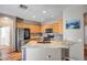 Modern kitchen with granite countertops, stainless steel appliances, and ample cabinet space for storage at 14246 W Columbus Ave, Goodyear, AZ 85395