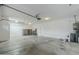 Spacious two-car garage with ample lighting and a clean, unpainted concrete floor at 1584 E Harrison E St, Chandler, AZ 85225
