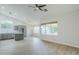 Open-concept kitchen and living area with gray cabinets and abundant natural light at 1584 E Harrison E St, Chandler, AZ 85225