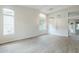 Bright living room with high ceilings, large windows, and modern light fixtures at 1584 E Harrison E St, Chandler, AZ 85225