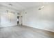 Bright and airy living room featuring hardwood floors and modern lighting fixtures at 1584 E Harrison E St, Chandler, AZ 85225