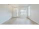 Bright and open living room with modern finishes and large windows at 1584 E Harrison E St, Chandler, AZ 85225