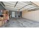 Spacious garage featuring ample built-in storage cabinets and high ceilings for convenient organization at 16753 W Bristol Ln, Surprise, AZ 85374
