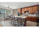 Stylish kitchen with bar stool seating and a bright dining area at 16753 W Bristol Ln, Surprise, AZ 85374