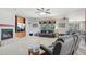 Spacious living room with fireplace, built-ins, and comfortable seating at 16753 W Bristol Ln, Surprise, AZ 85374