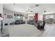 Spacious living room with fireplace and comfortable seating at 16753 W Bristol Ln, Surprise, AZ 85374