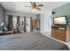 Comfortable main bedroom with large windows and ample space at 16753 W Bristol Ln, Surprise, AZ 85374