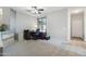 Cozy office with carpet, natural light, and traditional desk setup at 16753 W Bristol Ln, Surprise, AZ 85374