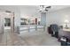 Home office featuring carpet floors, natural light, and a ceiling fan at 16753 W Bristol Ln, Surprise, AZ 85374