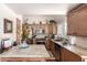 Charming kitchen features granite counters, stainless appliances, and ample cabinet space at 17119 N Joshua Path, Surprise, AZ 85374