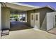 Covered carport with a storage shed for secure parking and additional storage space at 17200 W Bell Rd # 324, Surprise, AZ 85374