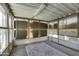 Cozy sunroom with carpet flooring, a rug and windowed walls with blinds at 17200 W Bell Rd # 324, Surprise, AZ 85374