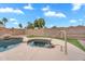 Backyard view highlighting the pool and spa, ideal for outdoor living and entertaining friends and Gathering at 1754 E Bradstock Way, San Tan Valley, AZ 85140
