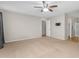 Spacious bedroom includes ceiling fan, carpet, and access to the bath and closet at 1754 E Bradstock Way, San Tan Valley, AZ 85140
