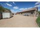 Expansive backyard with shed, desert landscaping, and space for outdoor activities at 17806 N 54Th Ln, Glendale, AZ 85308
