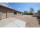 The backyard features a covered patio and a low-maintenance desert landscape at 17806 N 54Th Ln, Glendale, AZ 85308