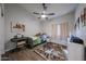 This bedroom features luxury vinyl tile and an updated ceiling fan at 17806 N 54Th Ln, Glendale, AZ 85308