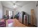 This spare bedroom includes vinyl floors and extra storage space at 17806 N 54Th Ln, Glendale, AZ 85308