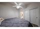This bedroom features luxury vinyl tile and access to a bathroom at 17806 N 54Th Ln, Glendale, AZ 85308
