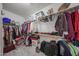 Spacious walk-in closet featuring ample storage and organization options at 17806 N 54Th Ln, Glendale, AZ 85308