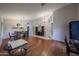 Bright living room featuring hardwood floors, high ceilings and dining area at 17806 N 54Th Ln, Glendale, AZ 85308