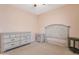 Neutral bedroom with a bed frame, dresser, and nightstand offering ample storage space at 17939 N Encanto Dr, Surprise, AZ 85374
