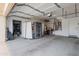 Spacious garage offering ample parking and storage space for vehicles and belongings at 17939 N Encanto Dr, Surprise, AZ 85374