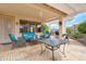 Outdoor seating area with barbecue, perfect for relaxation and al fresco dining with guests at 17939 N Encanto Dr, Surprise, AZ 85374