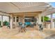 Covered patio with outdoor seating, perfect for outdoor dining and relaxing in the shade at 17939 N Encanto Dr, Surprise, AZ 85374