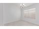 Bright room features neutral decor, a ceiling fan, and a window providing natural light at 2629 E Beverly Rd, Phoenix, AZ 85042