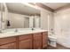 Bathroom featuring a well lit vanity and a shower with tub at 30 S 230Th Ave, Buckeye, AZ 85326