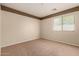 Bright bedroom with a window and neutral decor at 30 S 230Th Ave, Buckeye, AZ 85326