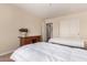 Comfortable bedroom with two beds, a desk and closet for ample storage at 30 S 230Th Ave, Buckeye, AZ 85326