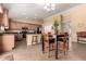Eat-in kitchen offers ample counter space, a breakfast bar, and is conveniently adjacent to the living area at 30 S 230Th Ave, Buckeye, AZ 85326