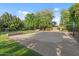 Spacious outdoor basketball court, surrounded by lush greenery and landscaping, perfect for recreation at 3011 E Morrison Ranch Pkwy, Gilbert, AZ 85296
