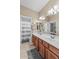 Bathroom features double sinks, and a door to the toilet and shower at 3011 E Morrison Ranch Pkwy, Gilbert, AZ 85296