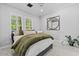 Cozy bedroom with soft lighting, comfortable bedding, and relaxing atmosphere at 3011 E Morrison Ranch Pkwy, Gilbert, AZ 85296