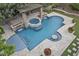 Inviting backyard pool with spa, fire features, and lounge area for relaxation at 3011 E Morrison Ranch Pkwy, Gilbert, AZ 85296