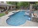 Backyard oasis with a pool, spa, fire features, and a covered bar area at 3011 E Morrison Ranch Pkwy, Gilbert, AZ 85296