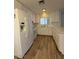 Clean kitchen with white appliances, cabinets, and plenty of natural light at 3150 E Corrine Dr, Phoenix, AZ 85032