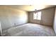 Bedroom featuring a window, drywall walls, concrete floor, and recessed lighting at 32123 N Lone Rancher Way, San Tan Valley, AZ 85140