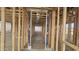 Interior view of new home framing displaying a large open concept design at 32123 N Lone Rancher Way, San Tan Valley, AZ 85140