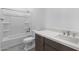 Bathroom featuring a tub shower, toilet, and single sink vanity with white quartz countertop at 32497 N 135Th Dr, Peoria, AZ 85383