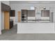 Modern kitchen with stainless appliances, kitchen island, and plenty of cabinet space at 32497 N 135Th Dr, Peoria, AZ 85383