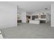 Open floorplan with a kitchen island, modern appliances and tile flooring at 32497 N 135Th Dr, Peoria, AZ 85383