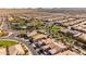 A vast community, with lush landscaping, parks, community pool, and a network of roads at 35756 N Clementine Trl, San Tan Valley, AZ 85140