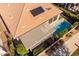 A tranquil outdoor space features a private pool, a cozy pergola, and solar panels at 35756 N Clementine Trl, San Tan Valley, AZ 85140