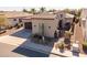 Attractive home showcasing a tiled roof, desert landscaping, and a gated entrance at 35756 N Clementine Trl, San Tan Valley, AZ 85140