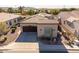 Beautiful home with a well-kept yard, desert landscaping, and a convenient two-car garage at 35756 N Clementine Trl, San Tan Valley, AZ 85140