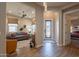 Open-concept floorplan connecting the entry to the living room with cozy seating at 35756 N Clementine Trl, San Tan Valley, AZ 85140